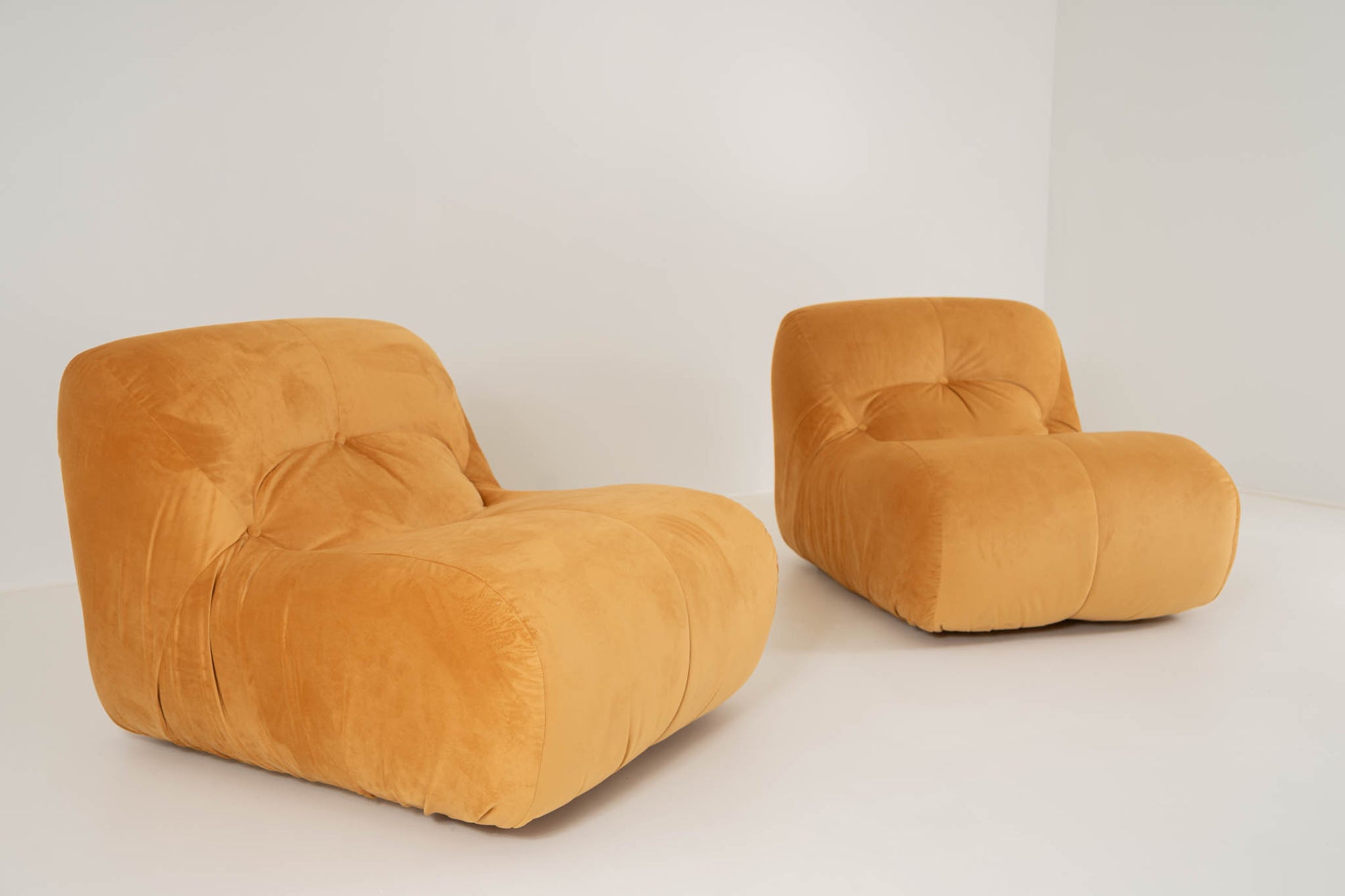 LOUNGE CHAIR NEWLY REUPHOLSTERED IN VELVETY FABRIC